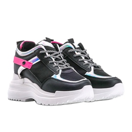 Svarta sneakers på en tjock Johan sula 1