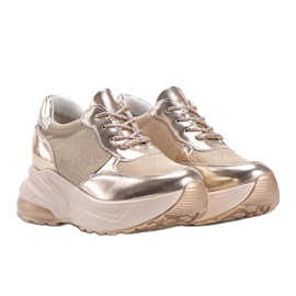 Gyllene sneakers med tjocka Amy -sulor 1