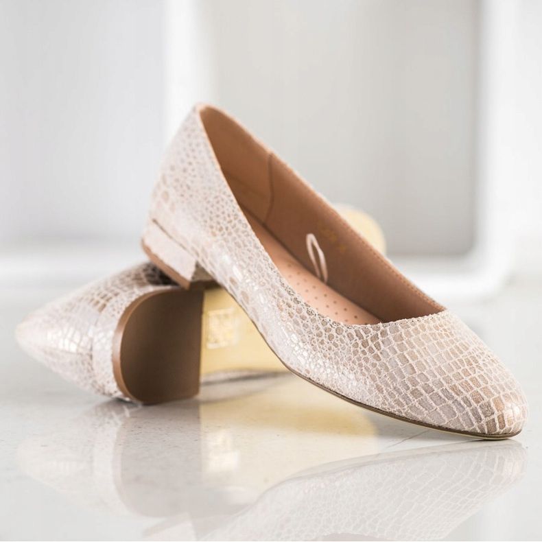 Ormtryck Sergio Leone pumps beige 1