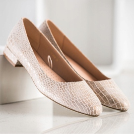 Ormtryck Sergio Leone pumps beige 2