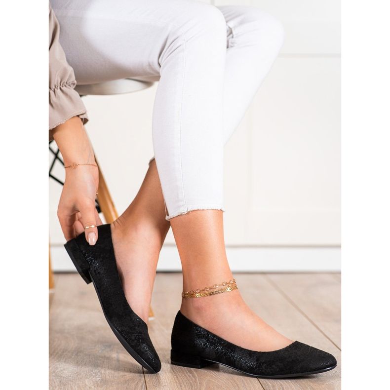 Sergio Leones platta klackar svart 1