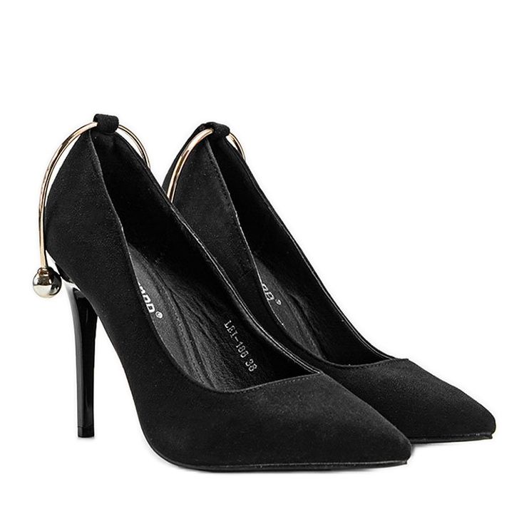 Svarta pumpar på en nål med Christinesmycken gyllene 1