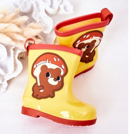 Barnens gula galoscher med en nalle 1