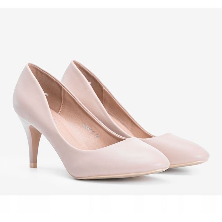 Beige pumps på en Dela -häl 1