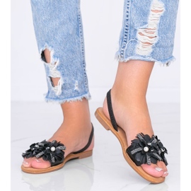 Svarta sandaler med flip-flops från Tristan 1