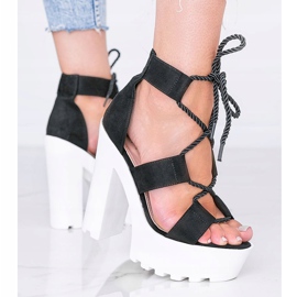 Svarta sandaler på en tjock Hera -plattform 1