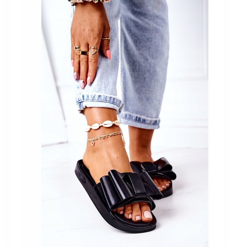 PS1 Gummi tofflor med rosett svart april 1