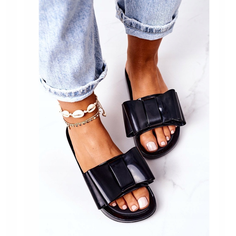 PS1 Gummi tofflor med rosett svart april 4