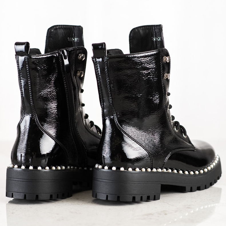 Bestelle Svarta arbetare med pärlor 1