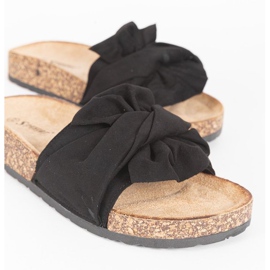 Svarta tofflor med en Step Of Pleasure -rosett 1