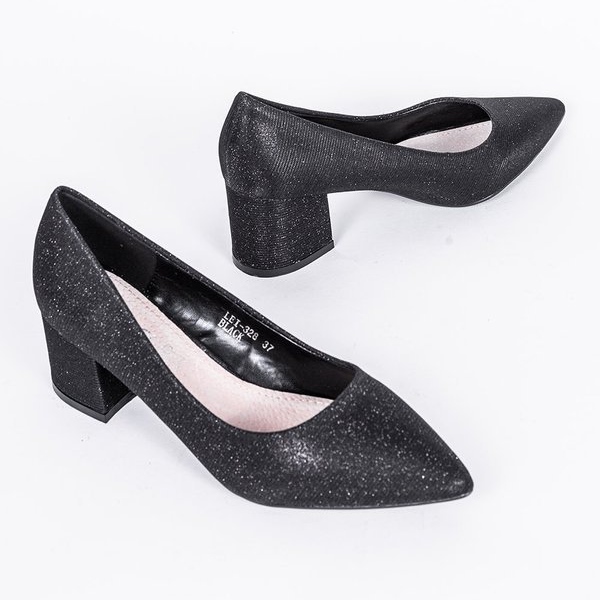 Svarta glödande pumpar på Laitas stolpe 1