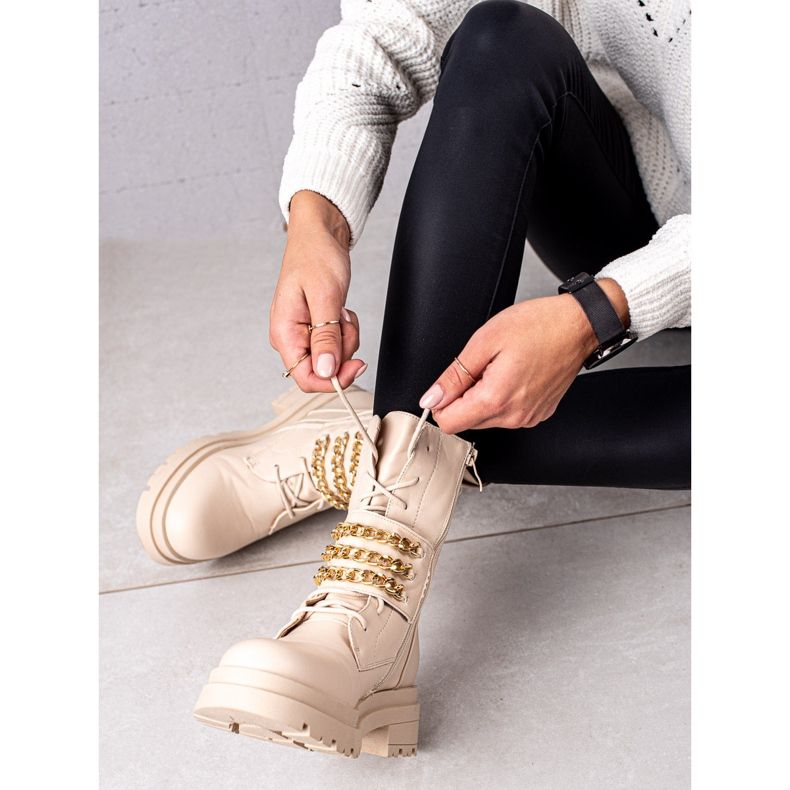 Seastar Arbetare Med En Kedja beige 1