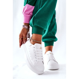 Läder sportskor på en vit Lemmy plattform 1