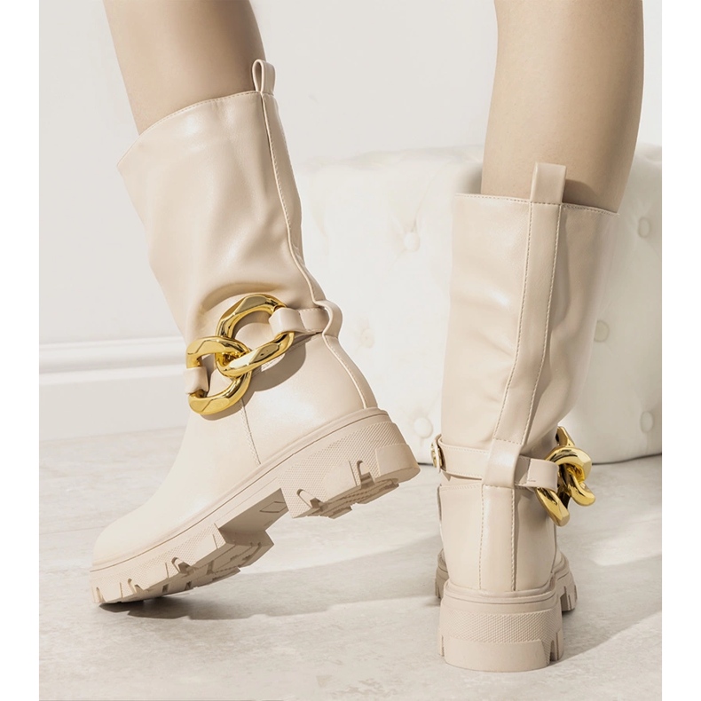 Beige isolerade stövlar med Harrison-kedja 1