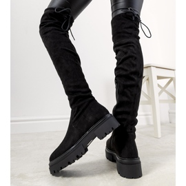 Svarta stövlar på hög Paulino-sula 1