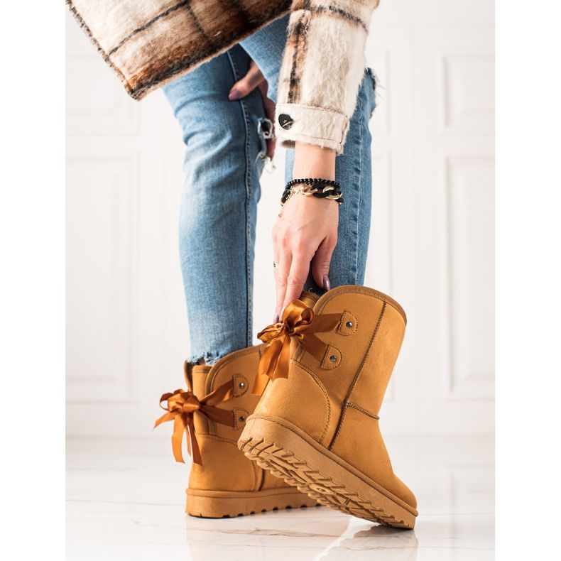 TRENDI Mukluki Med En Rosett gul 2