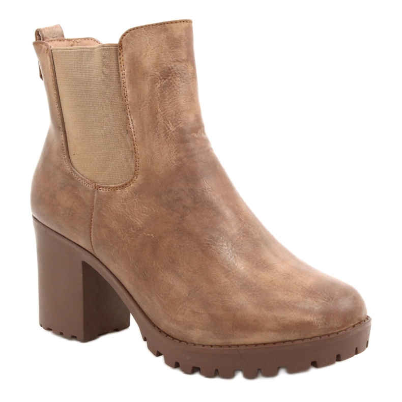 Beige stövlar på Auger -stolpen brun 1