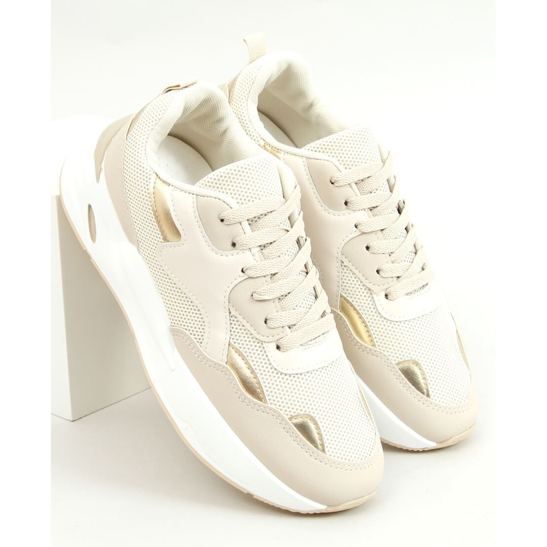 Astro Beige sneakers gyllene 1