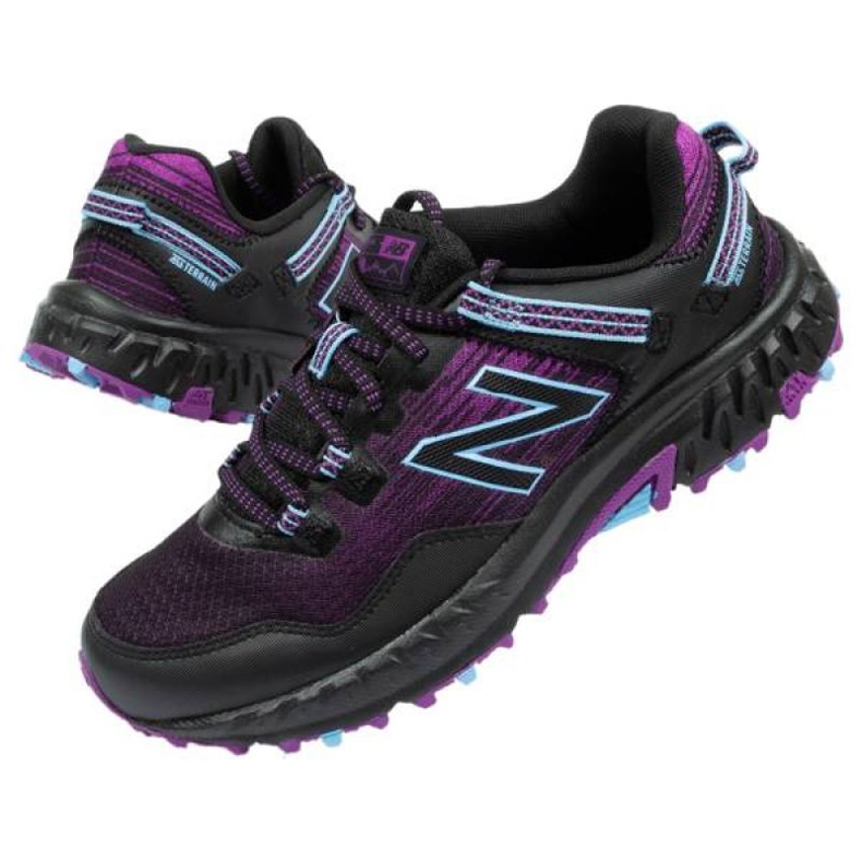 New Balance W WT410CM6 löparskor svart purpur 1