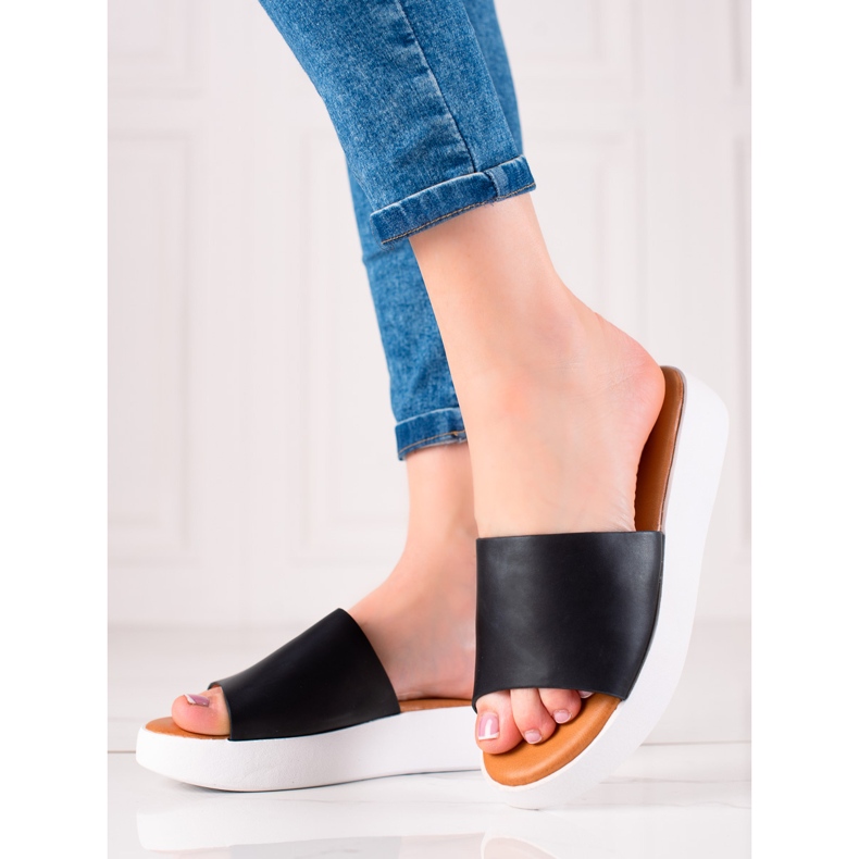 Encor Svarta tofflor på plattformen 1