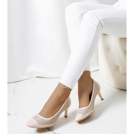 Genombrutna stift i beige och guld gyllene 1