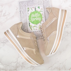 Skinnsneakers för kvinnor på en beige Filippo-plattform 2