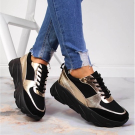 Damsportskor på Potocki-plattformen svart gyllene 1