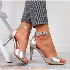 Damsandaler på högklackat guld Sergio Leone gyllene 1