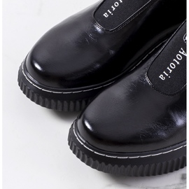 Svarta brogues på Siddons plattform 1