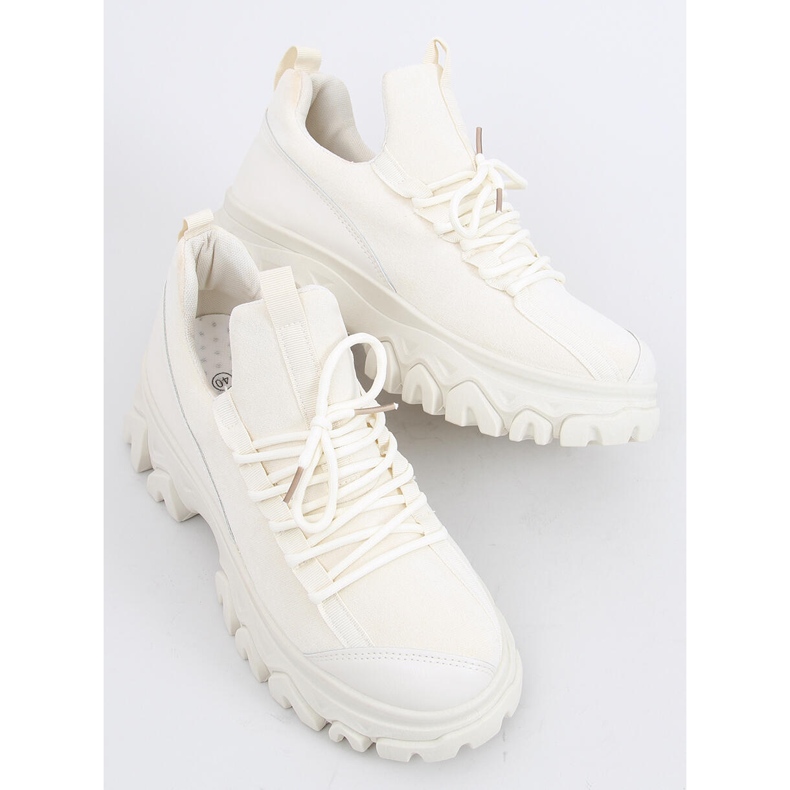 Huggy Beige sportskor med hög sula 2