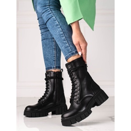 Shelovet kvinnliga arbetare på en tjock sula svart 2