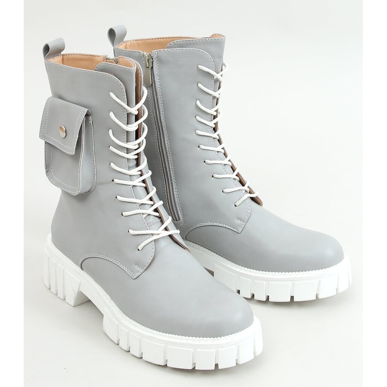 Arbetare med en Maruna L. GRÅ handväska 1