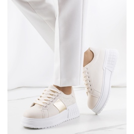Beige sneakers på Avenid-plattformen gyllene 1