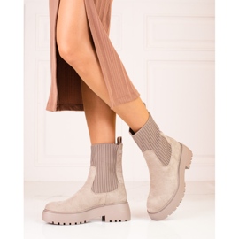 Kvinnliga arbetare med en flexibel skaft Shelovet beige 1