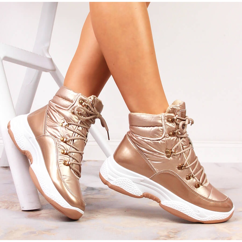 Högisolerade gyllene Vinceza sportskor för kvinnor 1