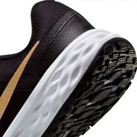 Nike Revolution 6 Jr DD1096 002 löparskor svart gyllene 6