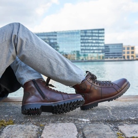 Vattentäta vinterstövlar för män isolerade med fårull Rieker F3602-25 brun 2