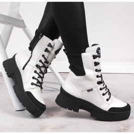 Kvinnors vita vattentäta läderstövlar Rieker Revolution W0374-80 svart 1