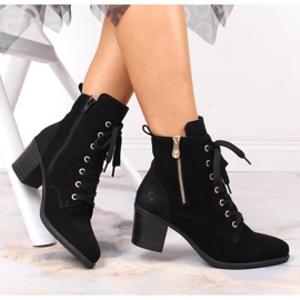 Stövlar i lädermocka på stolpisolerade Rieker W RKR564 svart 1