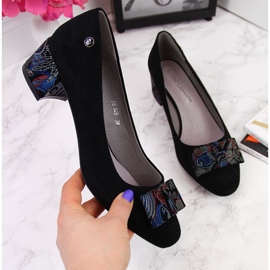 Svarta pumps på en dekorativ rosett från Sergio Leone 2