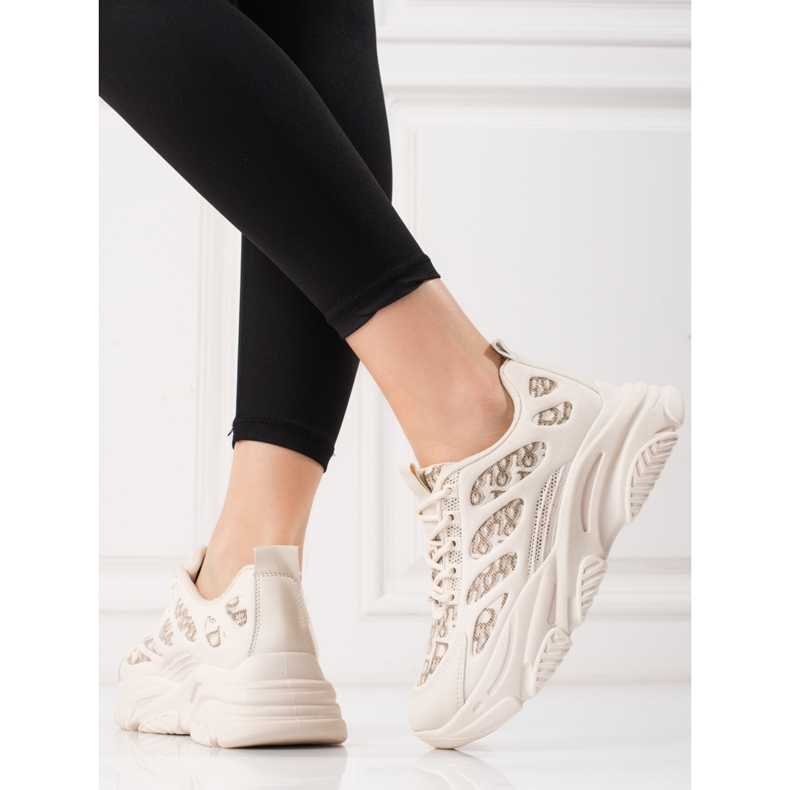Shelovet kvinnors sneakers på en tjock sula beige 2
