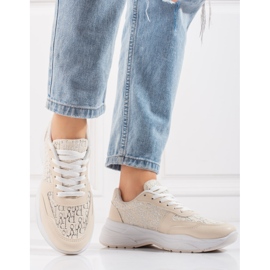 Shelovet sportskor för kvinnor med ett glänsande beigemönster 1