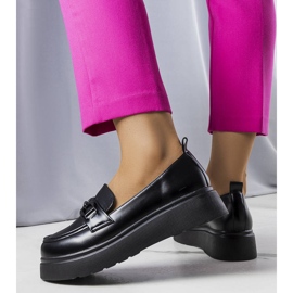 Svarta herrar dekorerade med en Gagnon-kil 1