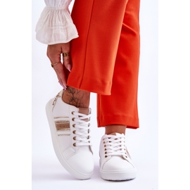 Sneakers i läder för kvinnor med dubbar i vitt och guld Dory 1