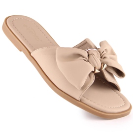 Platta sandaler för kvinnor med en beige rosett eVento 5479 1