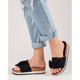 Plattofflor i mocka för kvinnor Vinceza svarta 1