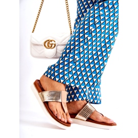 Kvinnors flip-flops på beige-guldplattform 3